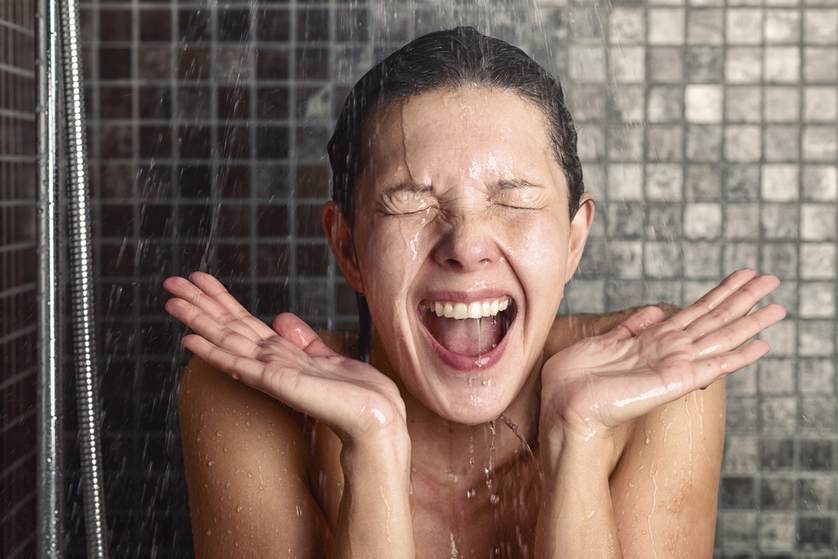 Woman taking a hot shower